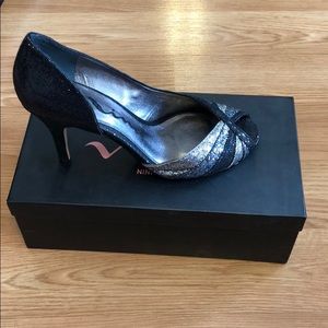 Black and silver open-toe heels